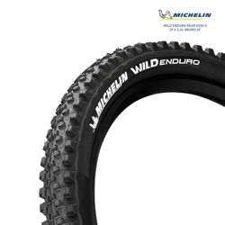 Pneu arrière michelin wild enduro gum-x 29x2.40 tub. Prêt concours. Ligne pliable noir 61-622